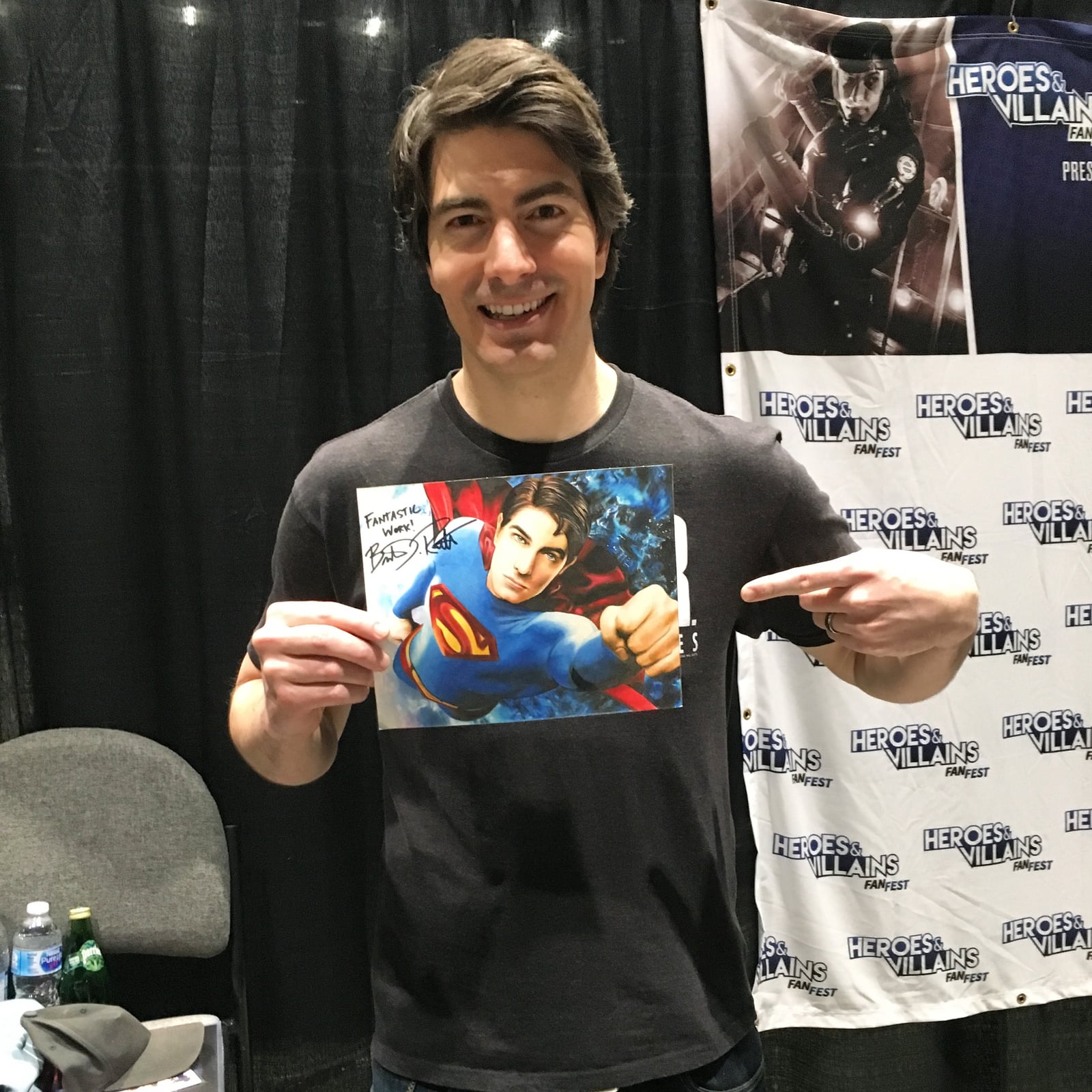 Brandon Routh holding Danny's artwork